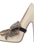 Gucci Womens Bow Embellished Patent Leather Pumps In White