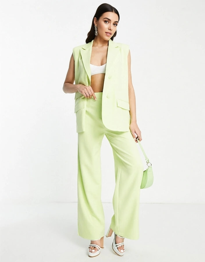 The Frolic Women's Relaxed Tailored Trousers With Split Hem in Soft Lime In Green