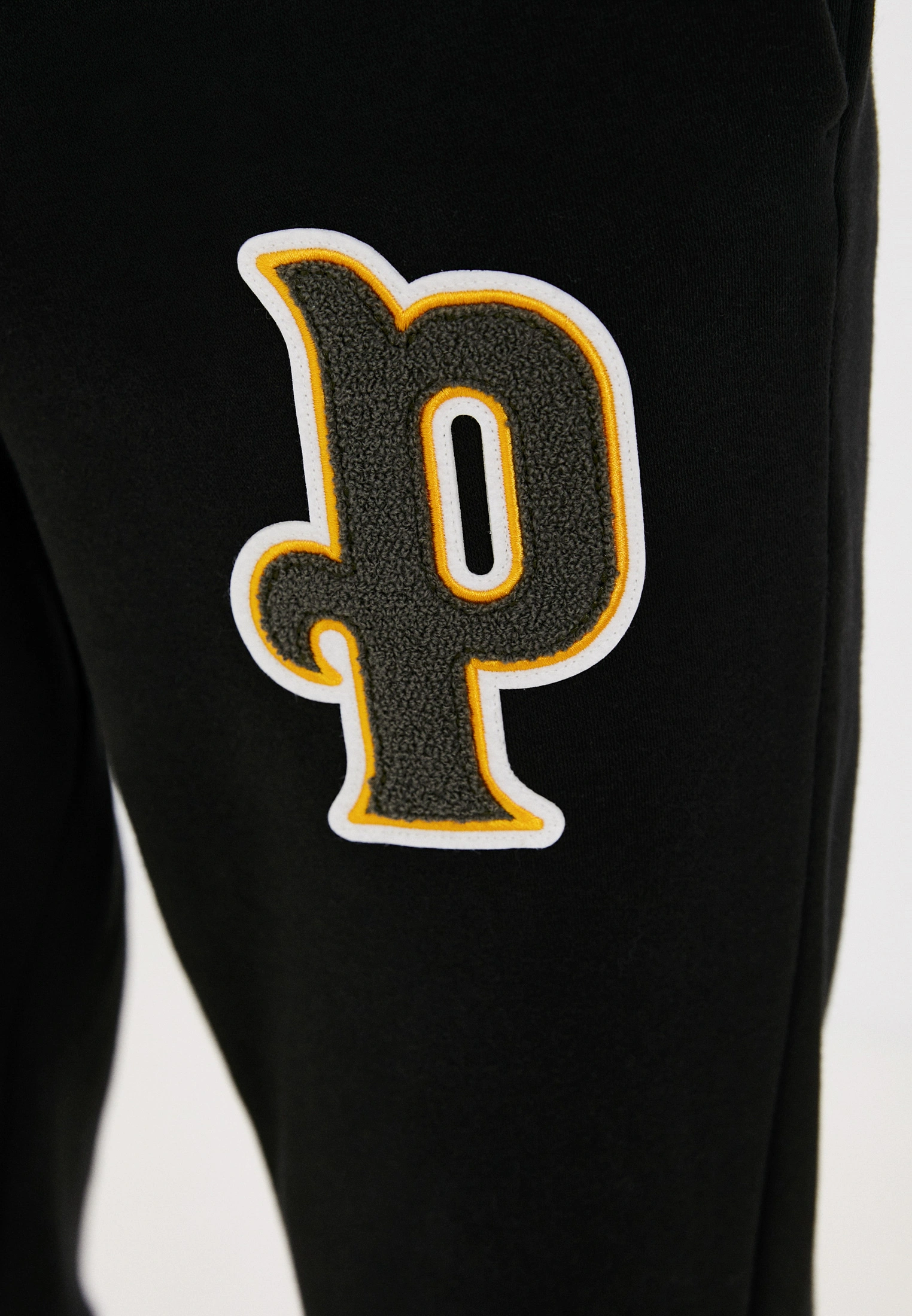 Mens Puma Varsity Logo Joggers in Black