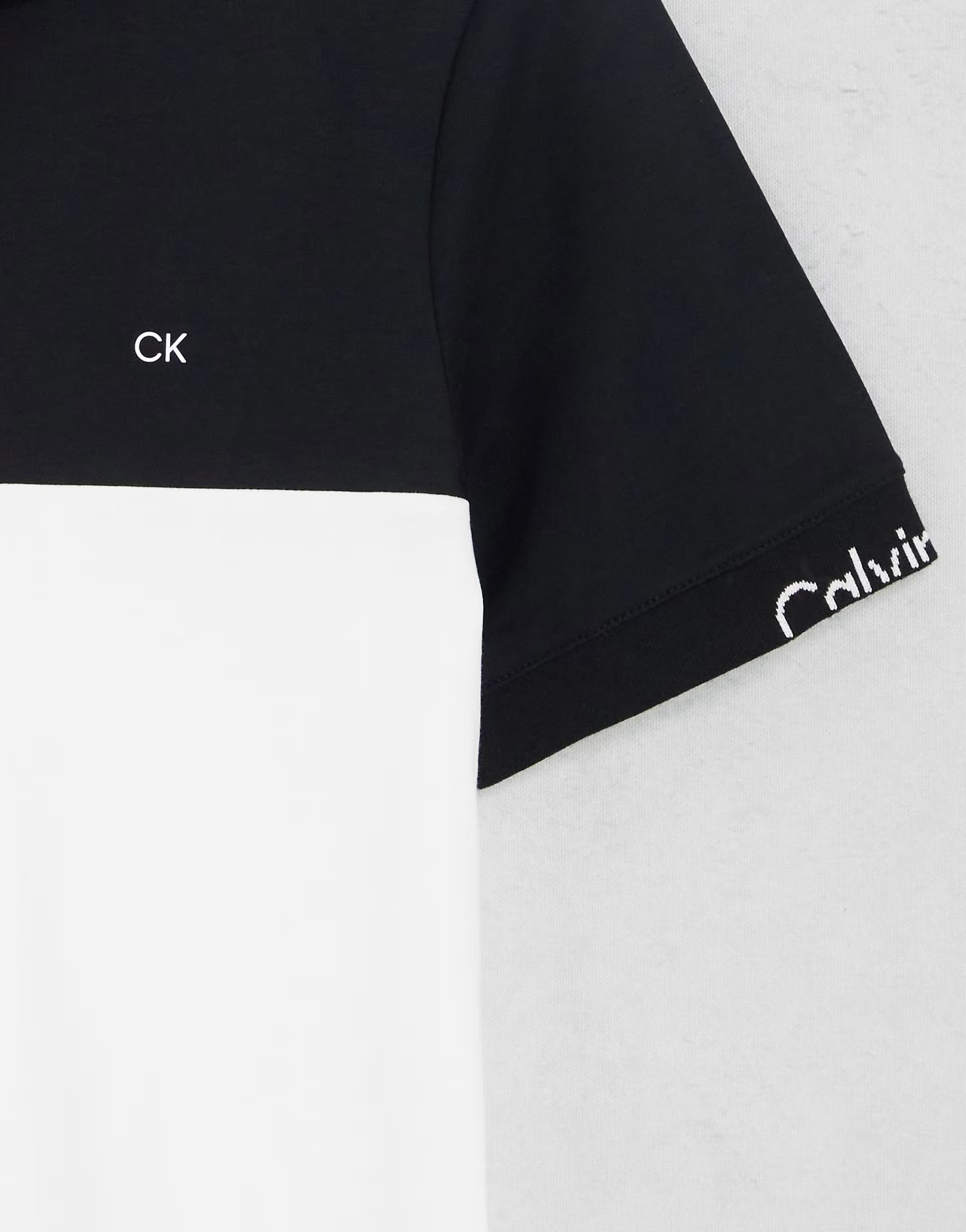 Calvin Klein Mens Liquid Touch Blocking Logo Polo in White/Black