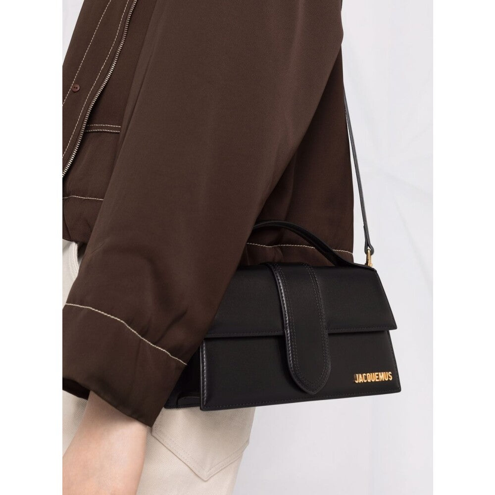Le Grand Bambino Black leather crossbody bag with gold hardware