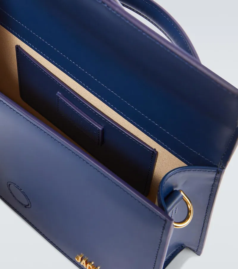 Le Grand Bambino Navy leather crossbody bag with gold hardware