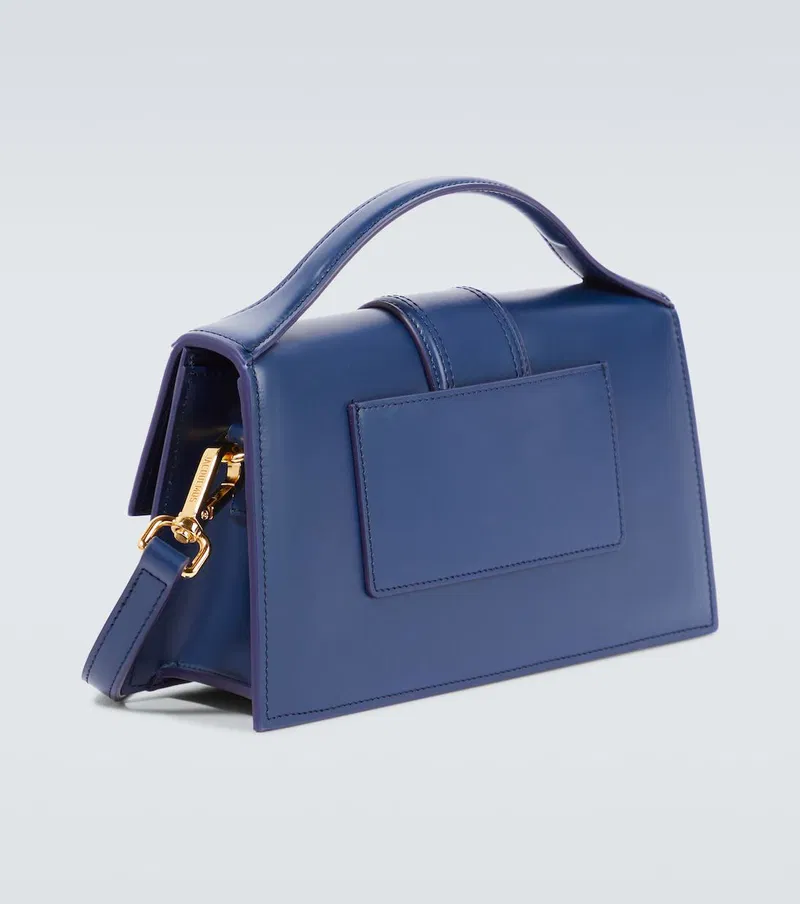 Le Grand Bambino Navy leather crossbody bag with gold hardware